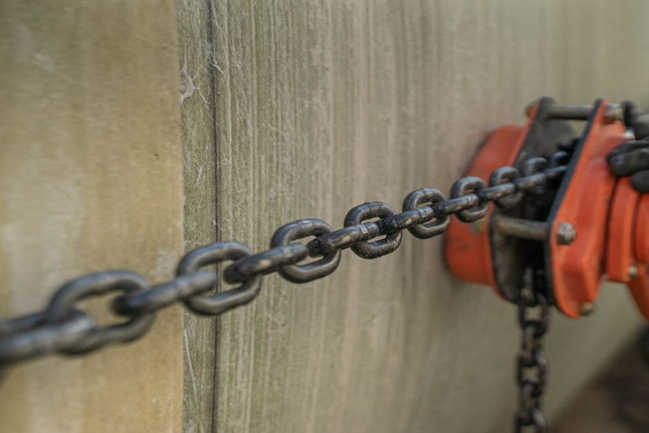 Why Security Hardware Pulls Loose: How Fasteners Transfer Load Into Walls