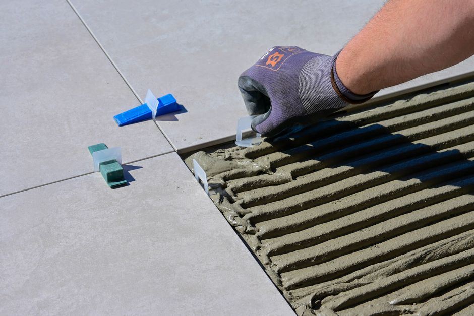 Matching the Repair to the Backsplash Failure: Adhesive, Grout, and Movement