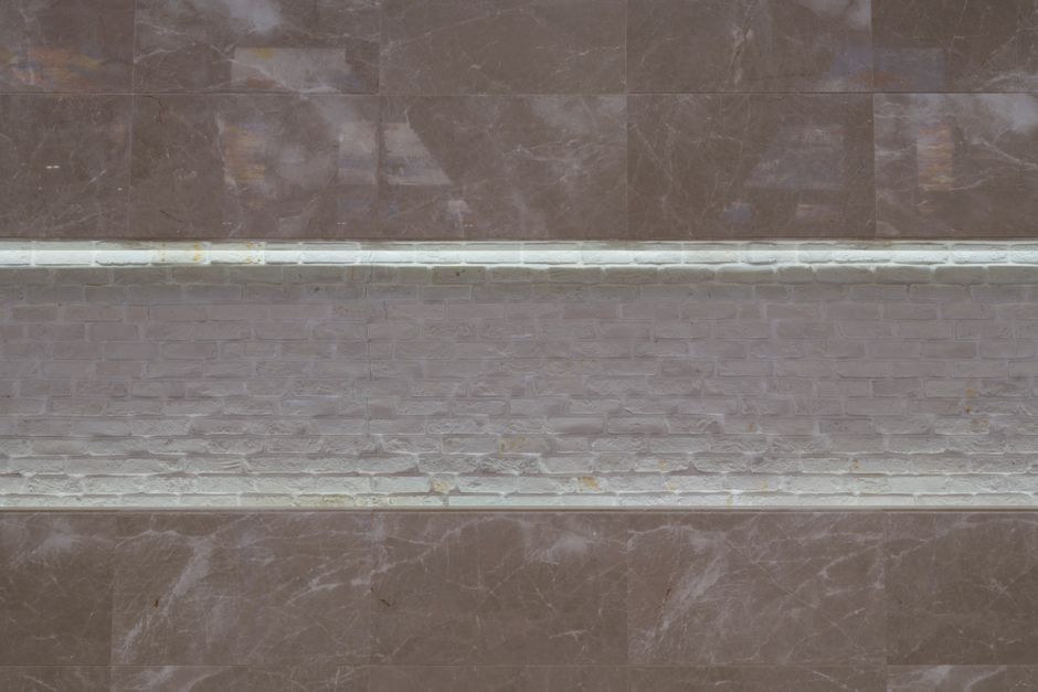 Why Limescale Fighters Work on Glass but Fail on Grout, Stone, and Metal