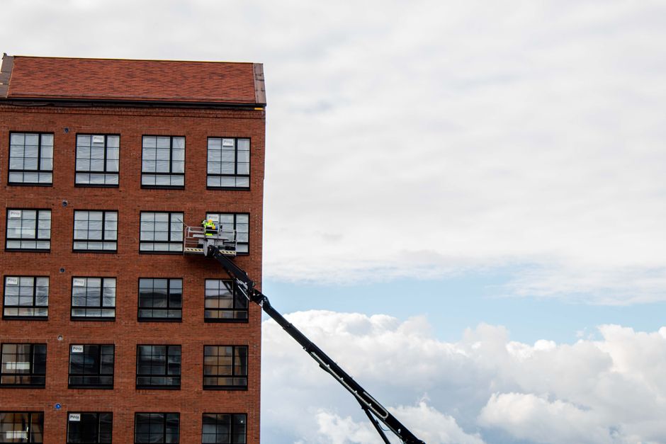 Ladders and Work Platforms: When a Homeowner Should Climb and When to Call a Pro