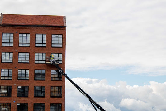 Ladders and Work Platforms: When a Homeowner Should Climb and When to Call a Pro