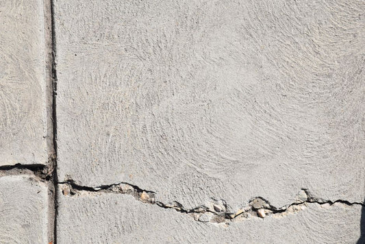 How to Handle Concrete and Asphalt Driveway Cracks Before They Become Bigger Repairs