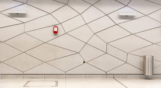 Why a Level, a Square, and a Straightedge Can Disagree About the Same Wall