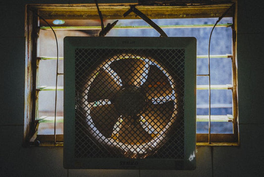 Why a Slightly Greasy Kitchen Exhaust Fan Loses Far More Than You'd Expect