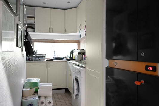 How to Organize a Small Laundry Room: From Overflowing Counter to Functional Work Zone