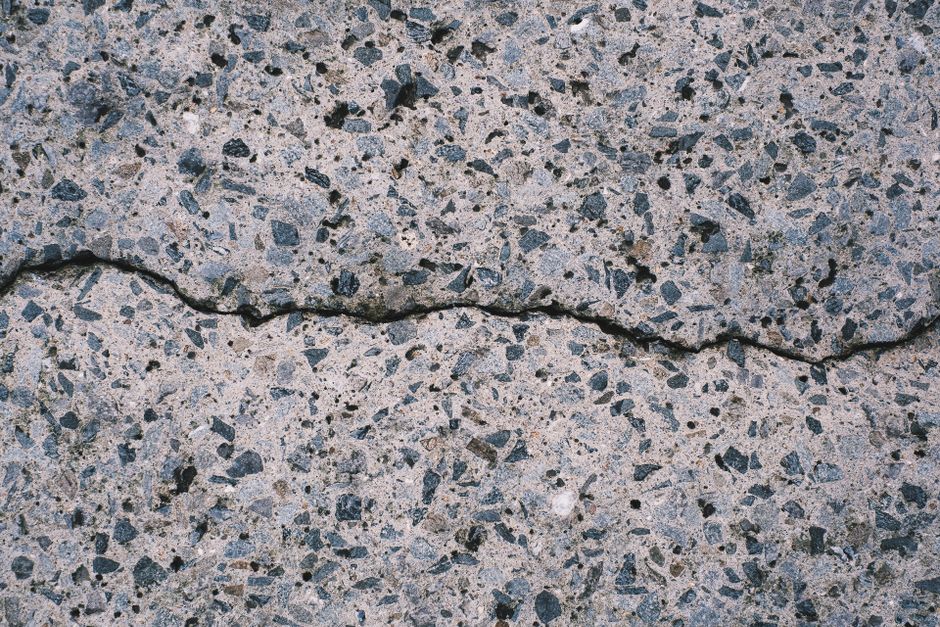 Why Filling a Crack in Concrete or Masonry Rarely Stops It From Returning