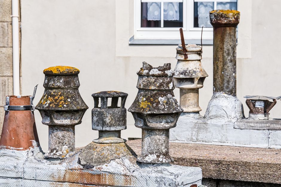 Chimney Caps and Dampers: When a Quick Fix Becomes a Permanent Solution