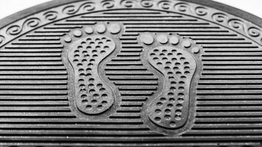Why Rubber Mats Turn Sticky and Gray: What the Residue Is Actually Made Of