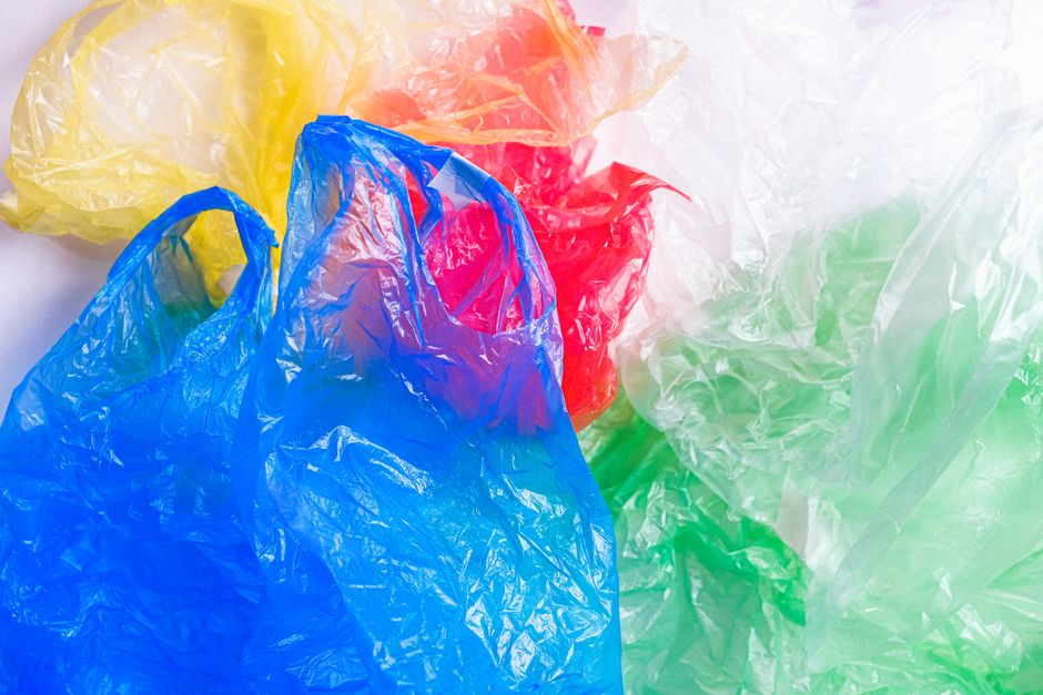 Reusable Bags vs. Paper, Plastic, and Cotton: When Does Reuse Actually Change the Impact?