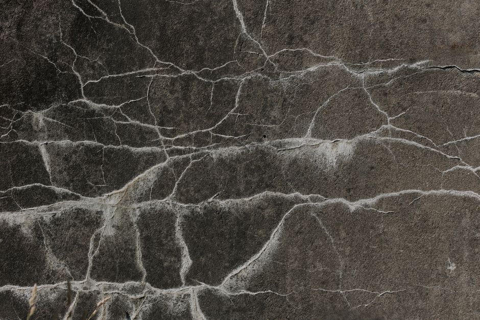 Why Concrete Slabs Crack: Reading Cracks, Joints, and Surface Damage Before You Patch