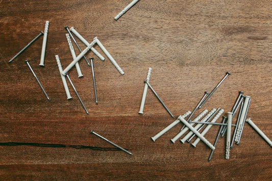 Floor Transitions and Thresholds: Why More Filler, Caulk, and Screws Often Make the Repair Worse