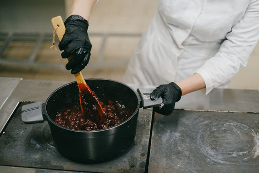 Why Acid Turns Some Pots Reactive and Some Sauces Gritty: A Cookware-and-Chemistry Guide