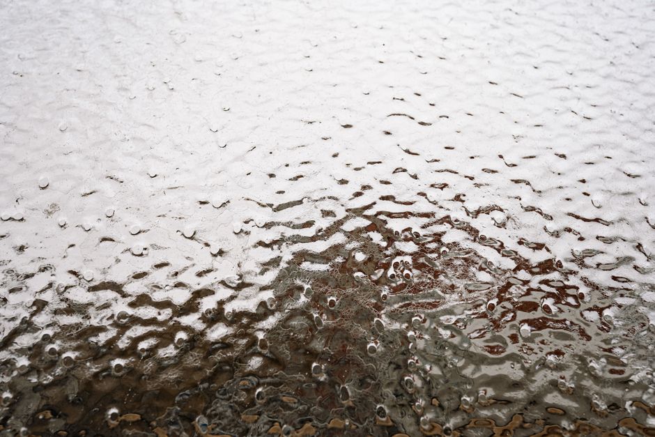 Why Hard Water Leaves White Film on Glass and Fixtures — And Why It Gets Harder to Remove