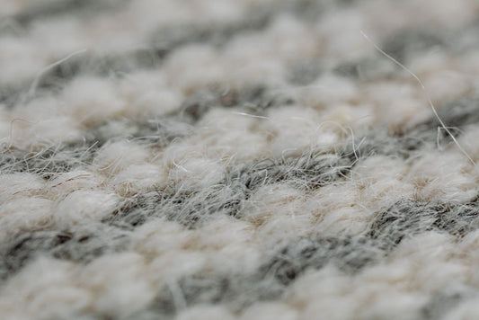 Why Carpet Fibers Hold Dirt Differently Than Hard Floors Do