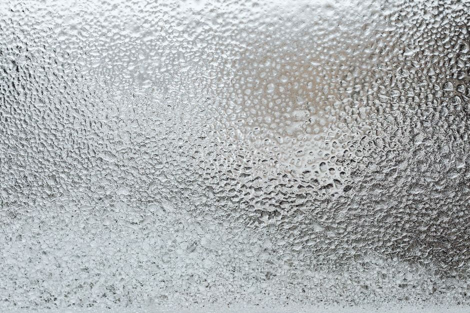 Why a Freezer Frosts Up: The Science of Moisture, Cold Surfaces, and Ice Buildup
