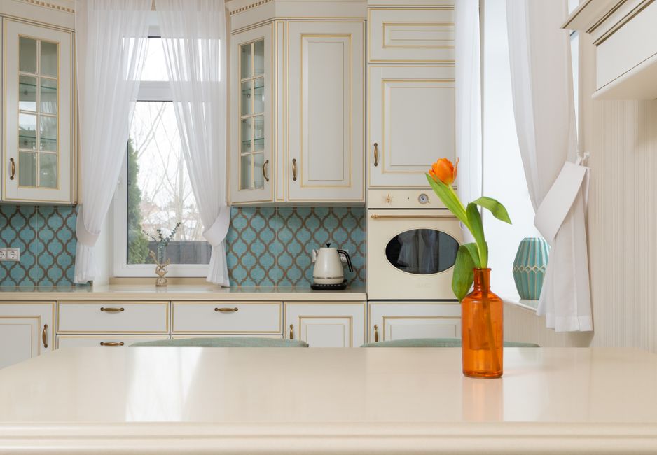 Why Kitchen Grease Turns Into a Hard Amber Film on Cabinets, and What Actually Dissolves It