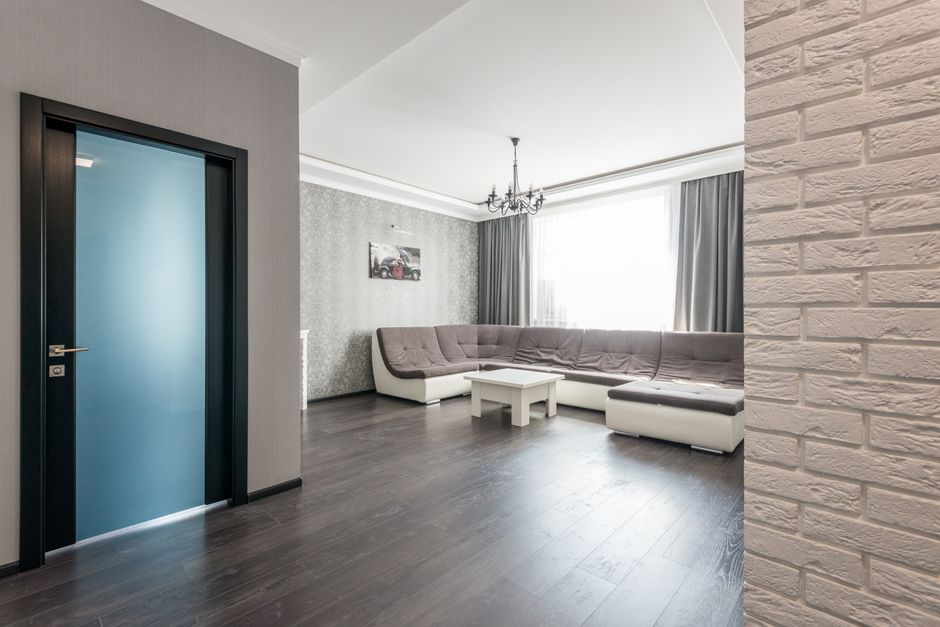 Why Laminate Floors Get Dull, Streaky, and Swollen: Matching Cleaning to the Wear Layer