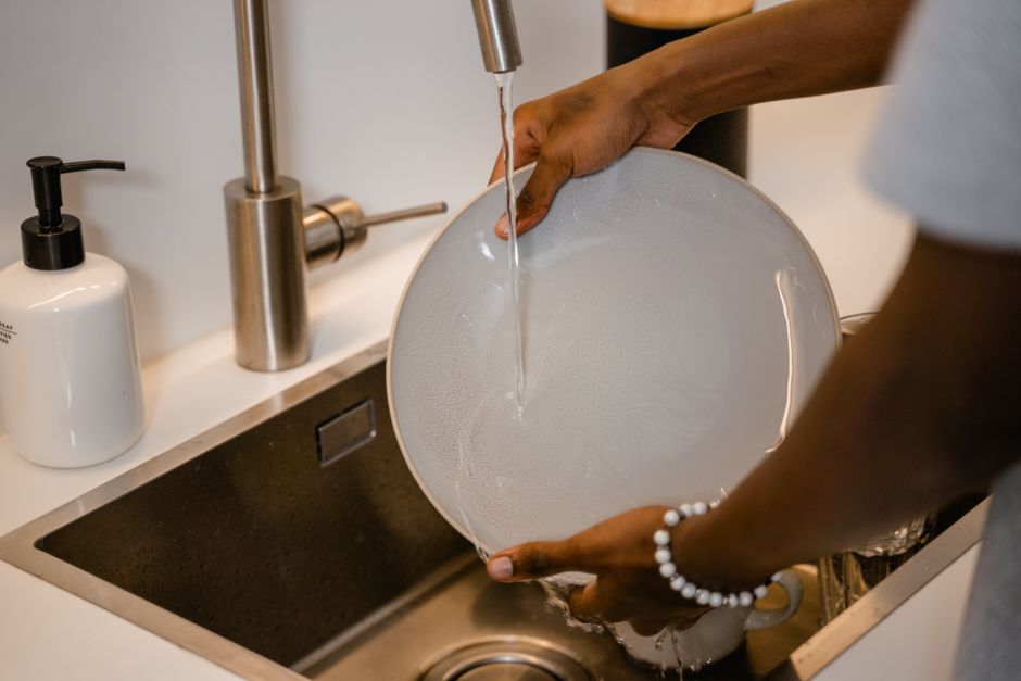 When Does Hand Washing Dishes Beat a Dishwasher? A Life-Cycle View