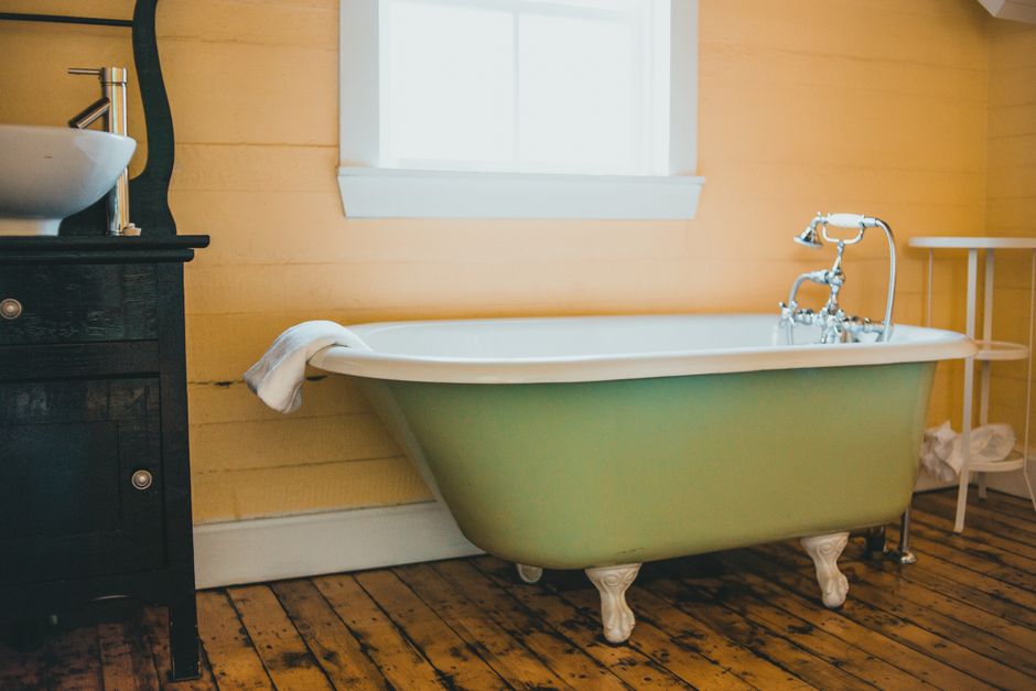 How to Fix a Slow-Draining Bathtub in an Old House Without Making It Worse