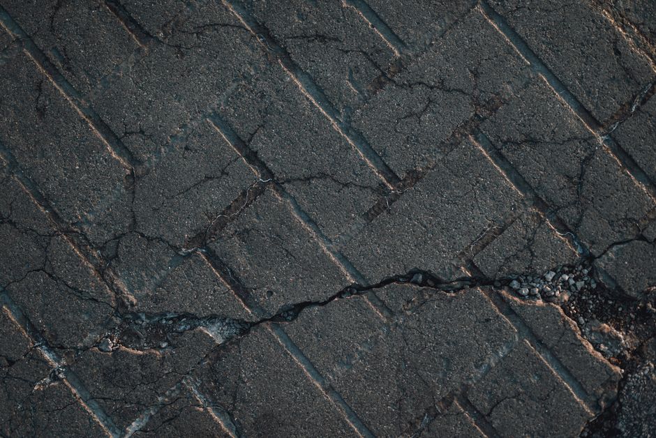 Why Driveway Cracks Keep Coming Back and What Actually Controls Them