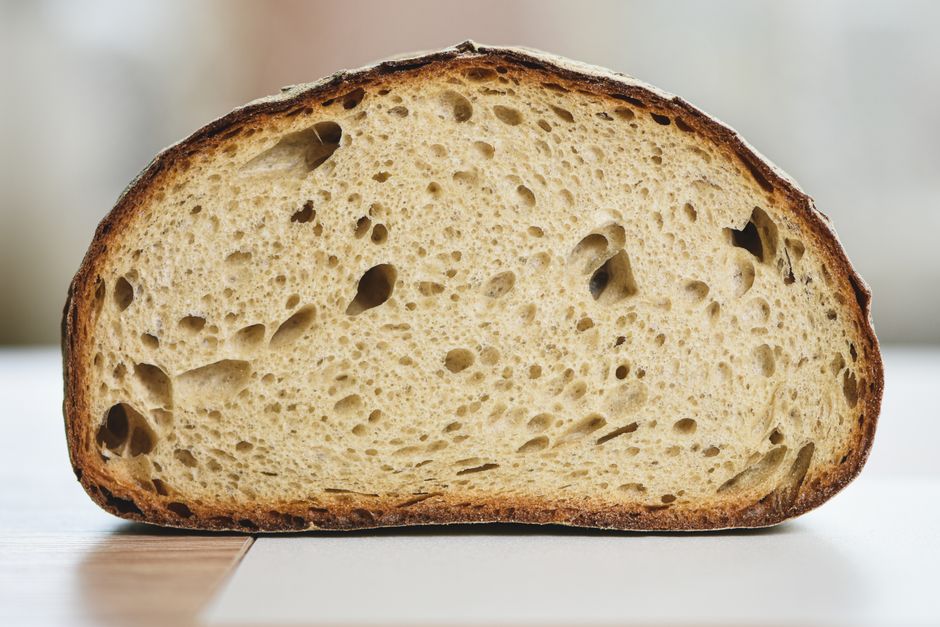 Why Sourdough Crumb Firms Up as It Cools: Protein, Starch, and Moisture in the Baked Loaf