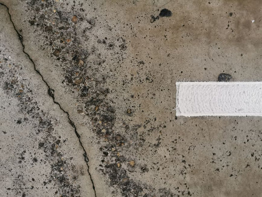 Why Construction Adhesive Fails on Baseboards: Movement, Substrate, and Bond Mechanics